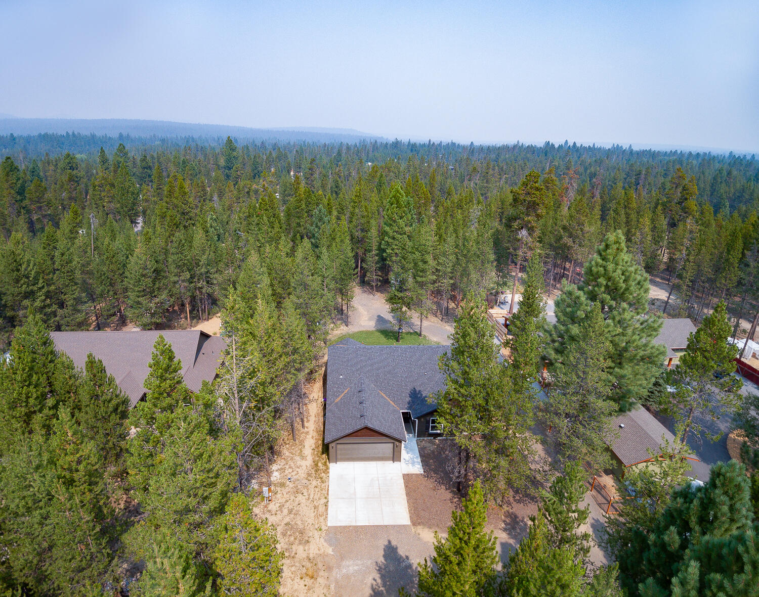 17160 Elsinore Road Bend, OR 97707 - Photo 36 of 47 an aerial view of multiple house