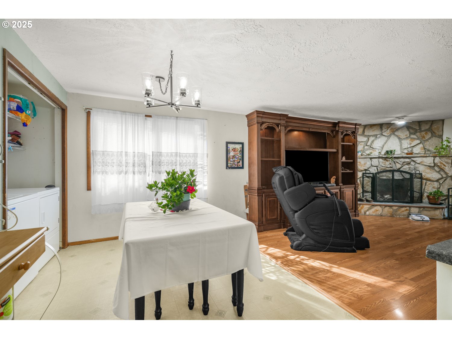 1349 Juniper Street North Keizer, OR 97303 - Photo 7 of 18 a living room with furniture and a flat screen tv