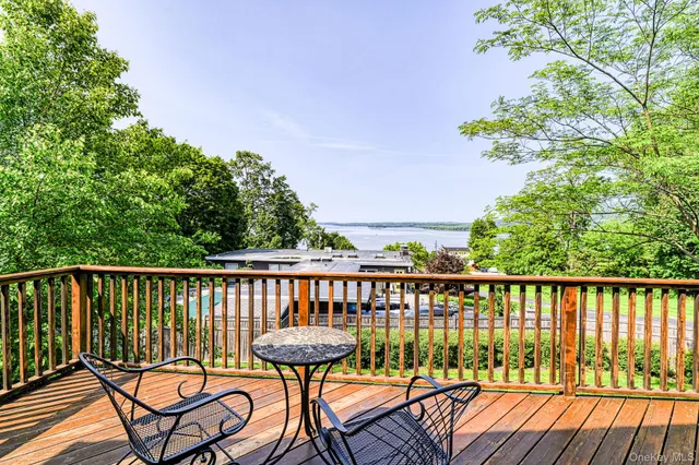 a view of a chairs on the roof deck