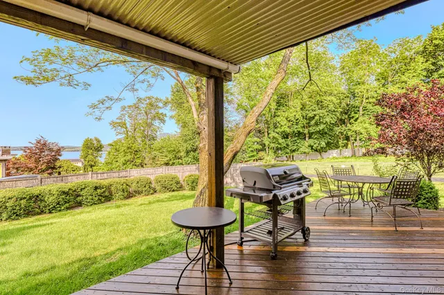 a view of swimming pool with furniture