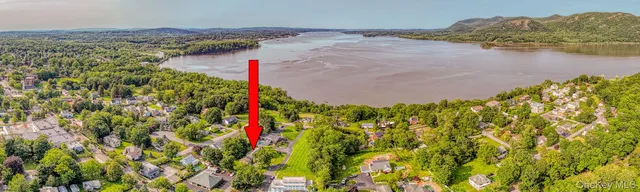 a view of a lake with a mountain in the background