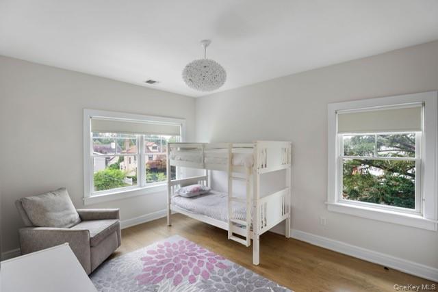 113 Brown Road Scarsdale, NY 10583 - Photo 16 of 27 a bedroom with a bed and a window