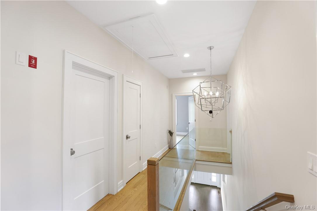 113 Brown Road Scarsdale, NY 10583 - Photo 19 of 27 a view of a hallway with furniture and entryway