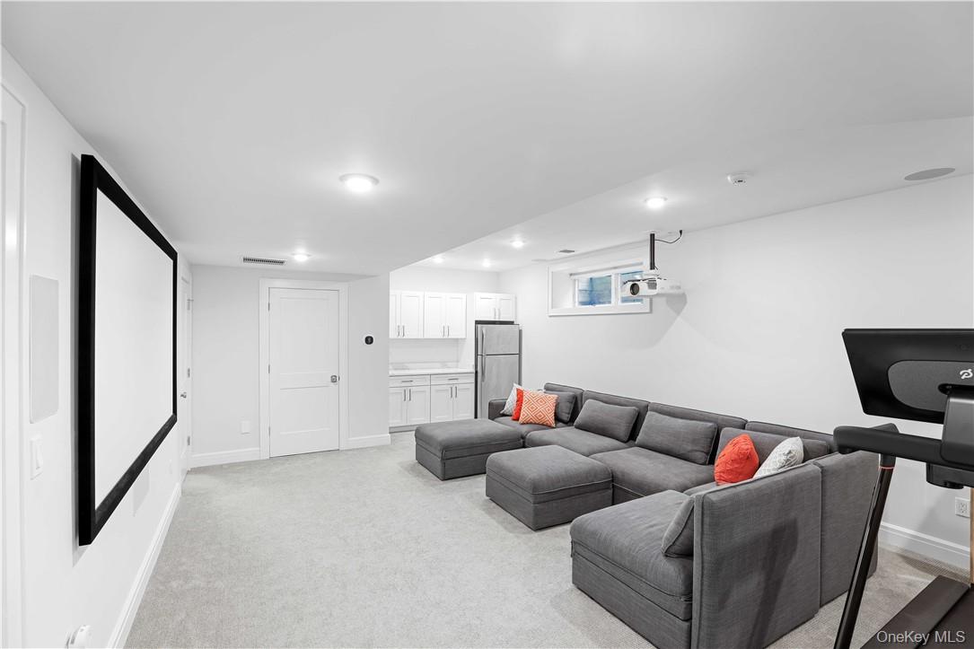 113 Brown Road Scarsdale, NY 10583 - Photo 20 of 27 a living room with furniture and a couch