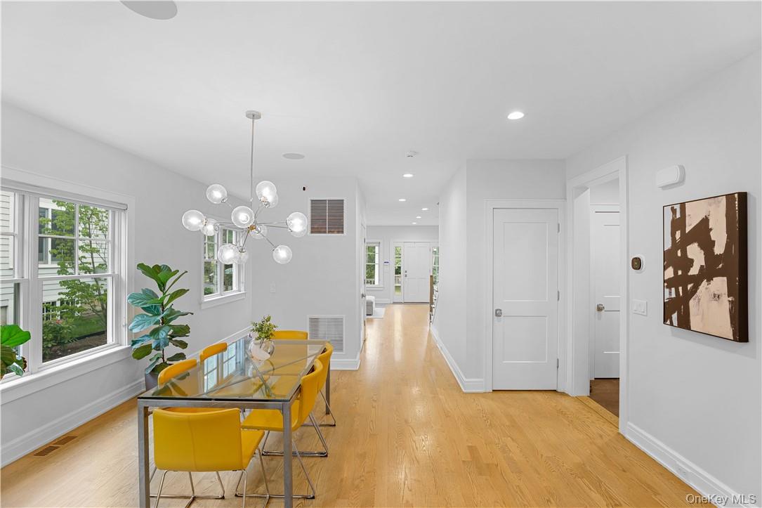 113 Brown Road Scarsdale, NY 10583 - Photo 6 of 27 a living room with furniture and a chandelier