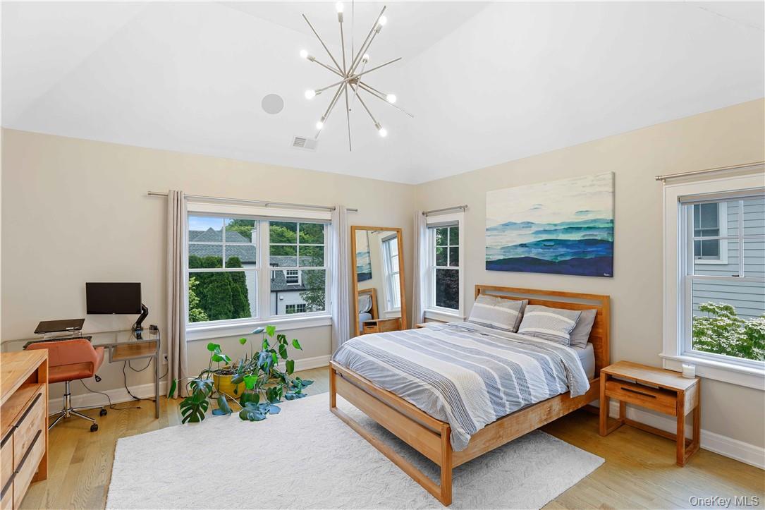 113 Brown Road Scarsdale, NY 10583 - Photo 10 of 27 a bedroom with a bed window and couch