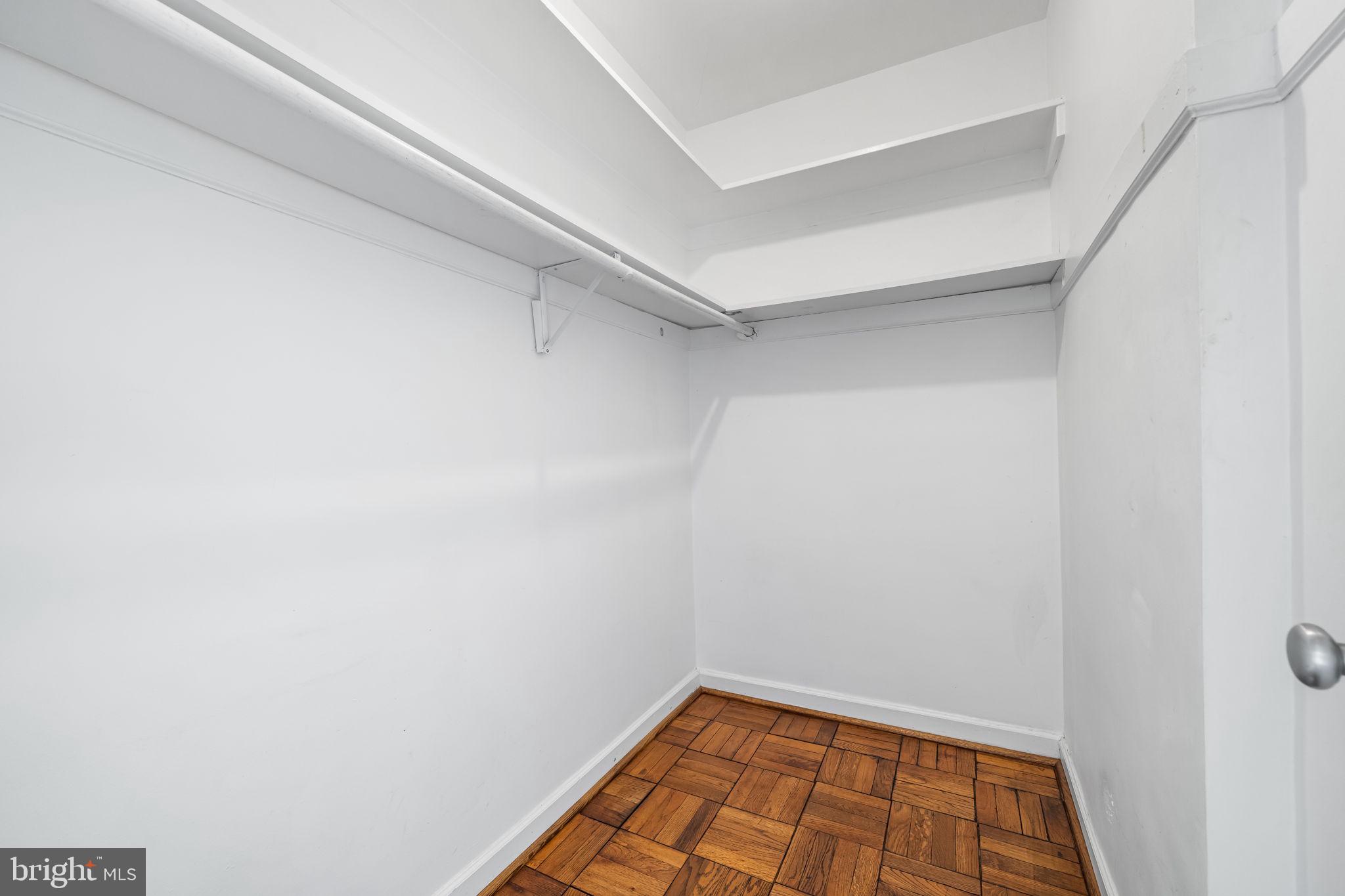 4301 Massachusetts Avenue Northwest, Unit 6006 Washington, DC 20016 - Photo 11 of 33 a view of a room with wooden floor