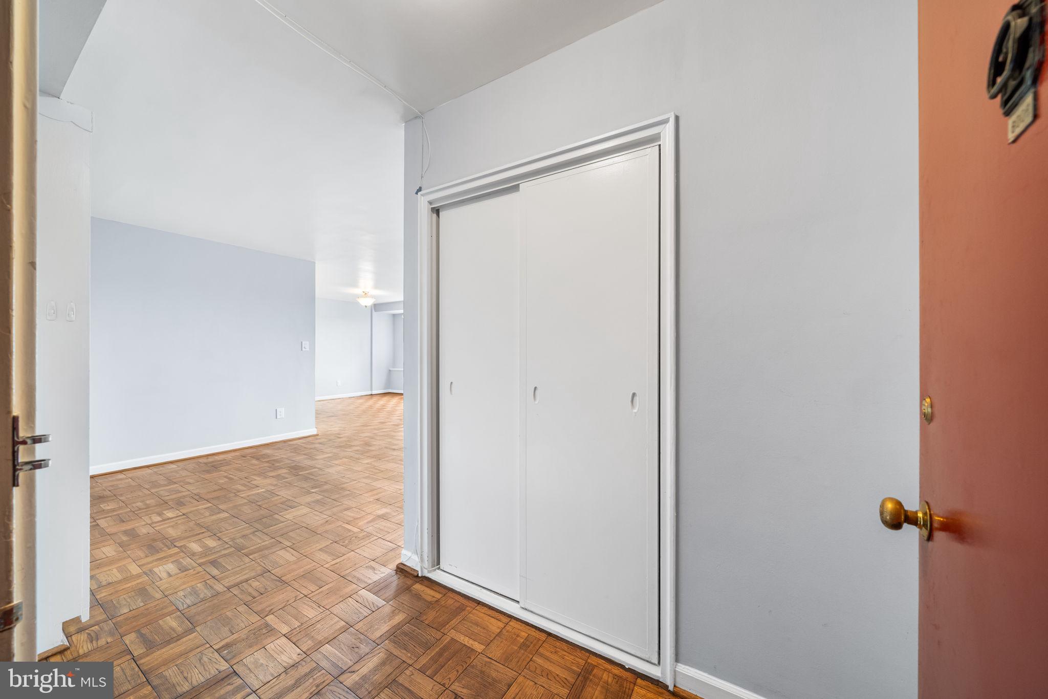 4301 Massachusetts Avenue Northwest, Unit 6006 Washington, DC 20016 - Photo 15 of 33 wooden floor in an empty room