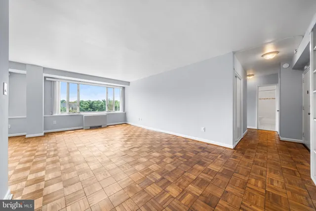 a view of an empty room and window