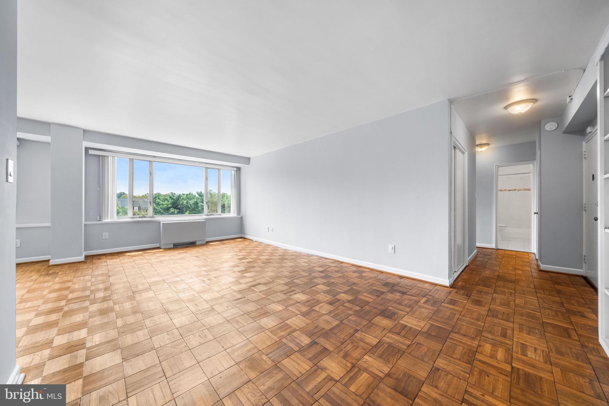 4301 Massachusetts Avenue Northwest, Unit 6006 Washington, DC 20016 - Photo 17 of 33 a view of an empty room and window