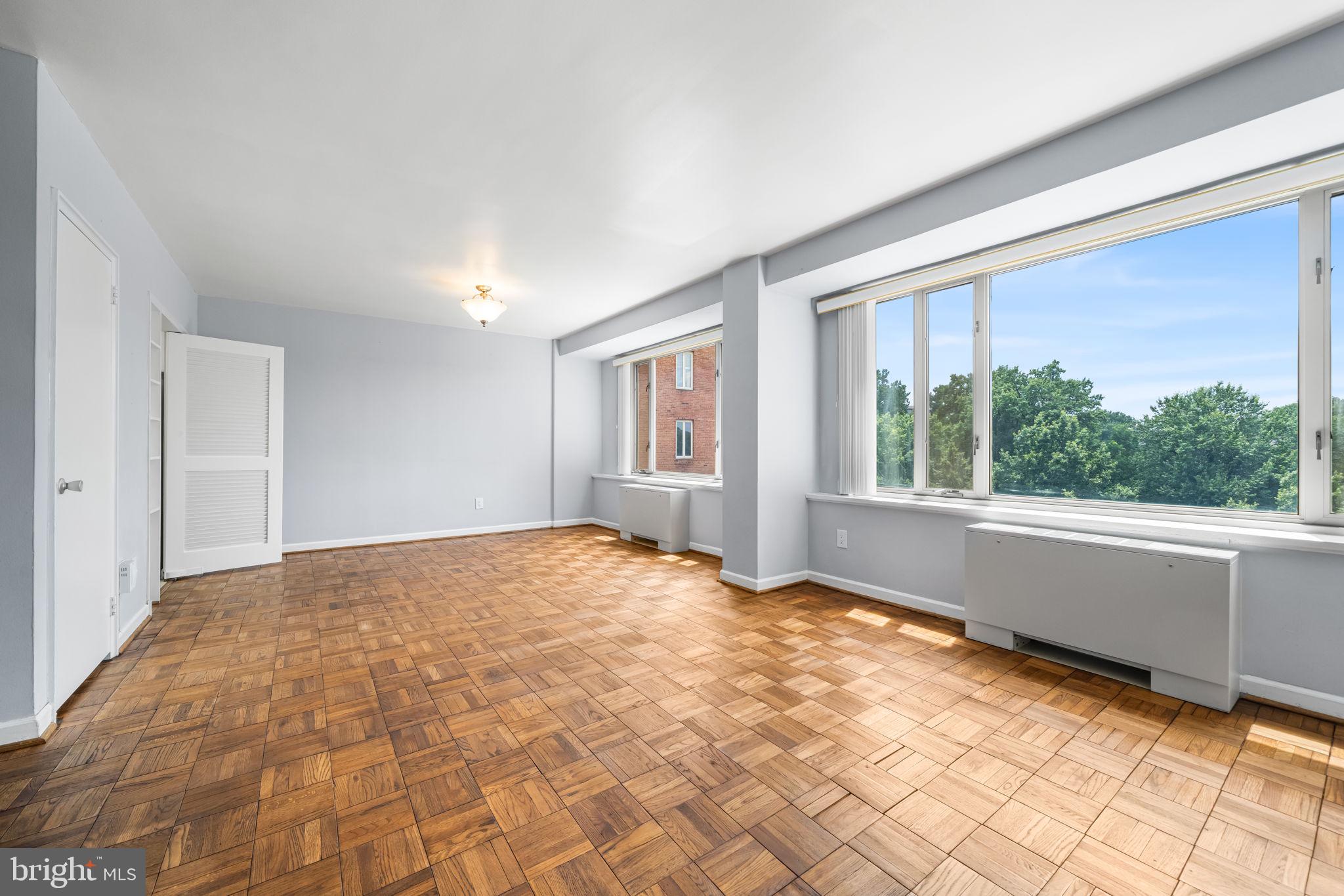 4301 Massachusetts Avenue Northwest, Unit 6006 Washington, DC 20016 - Photo 19 of 33 a view of an empty room with a window