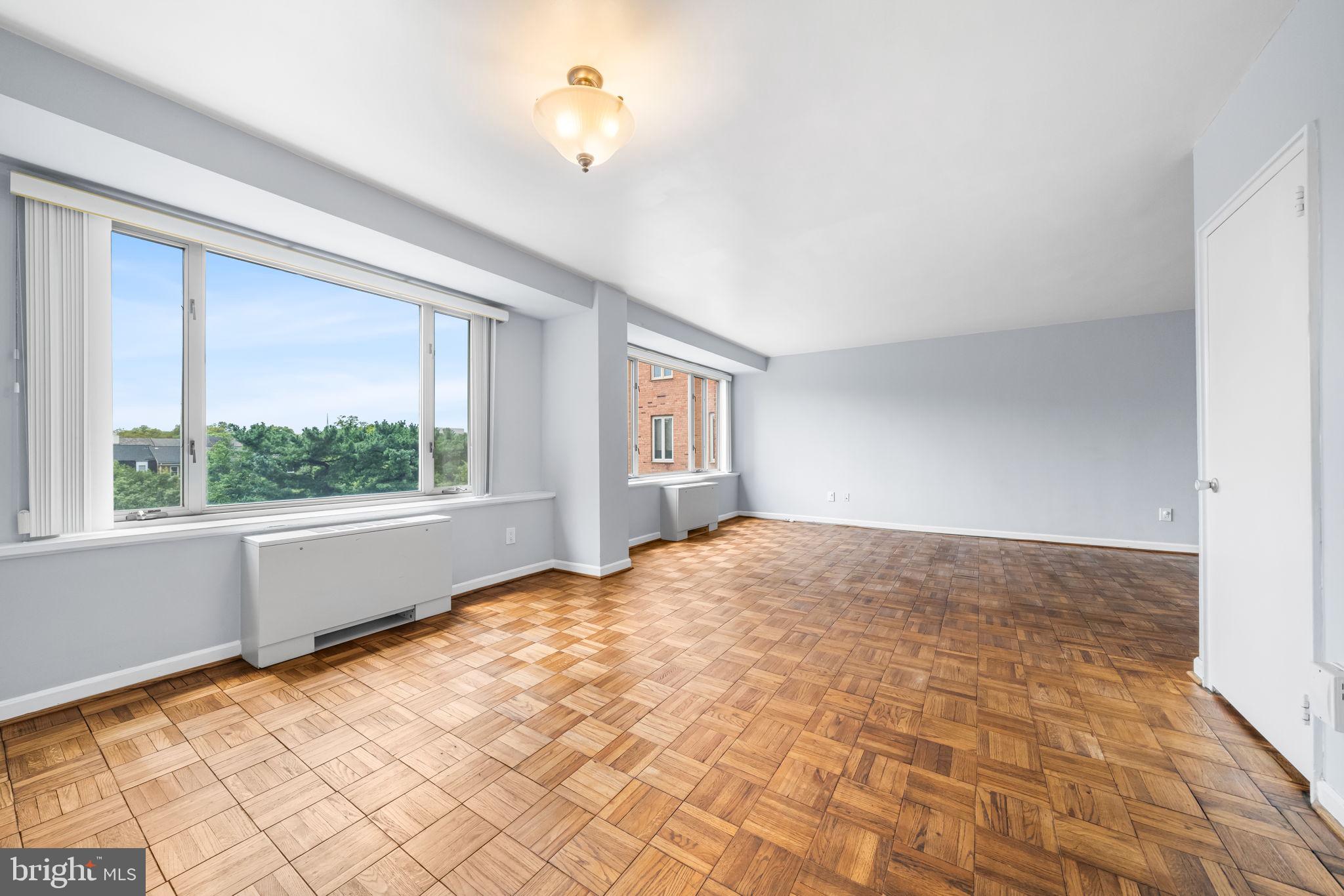 4301 Massachusetts Avenue Northwest, Unit 6006 Washington, DC 20016 - Photo 22 of 33 a view of an empty room with a window