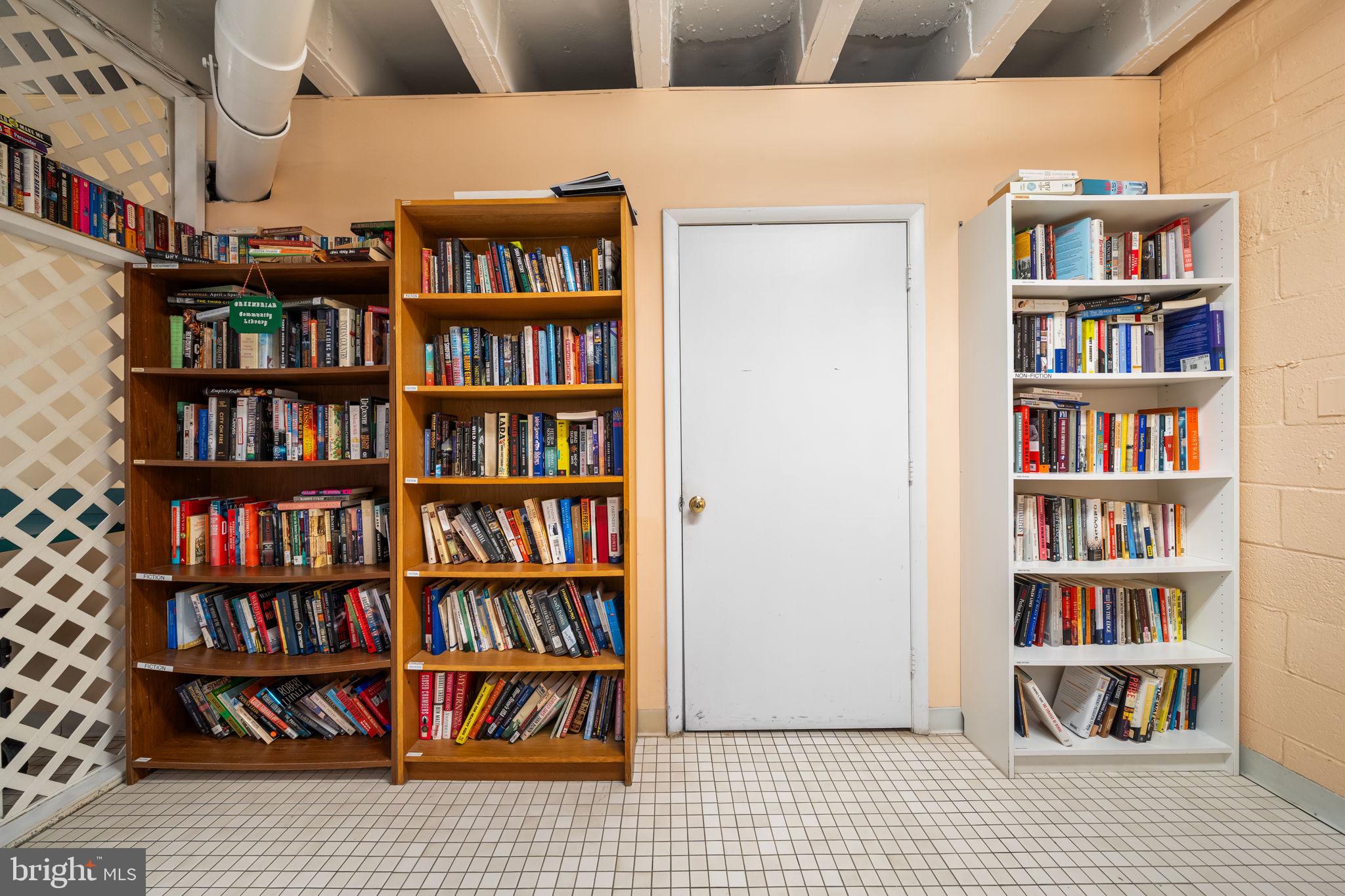 4301 Massachusetts Avenue Northwest, Unit 6006 Washington, DC 20016 - Photo 27 of 33 a view of a book shelf with lots of books