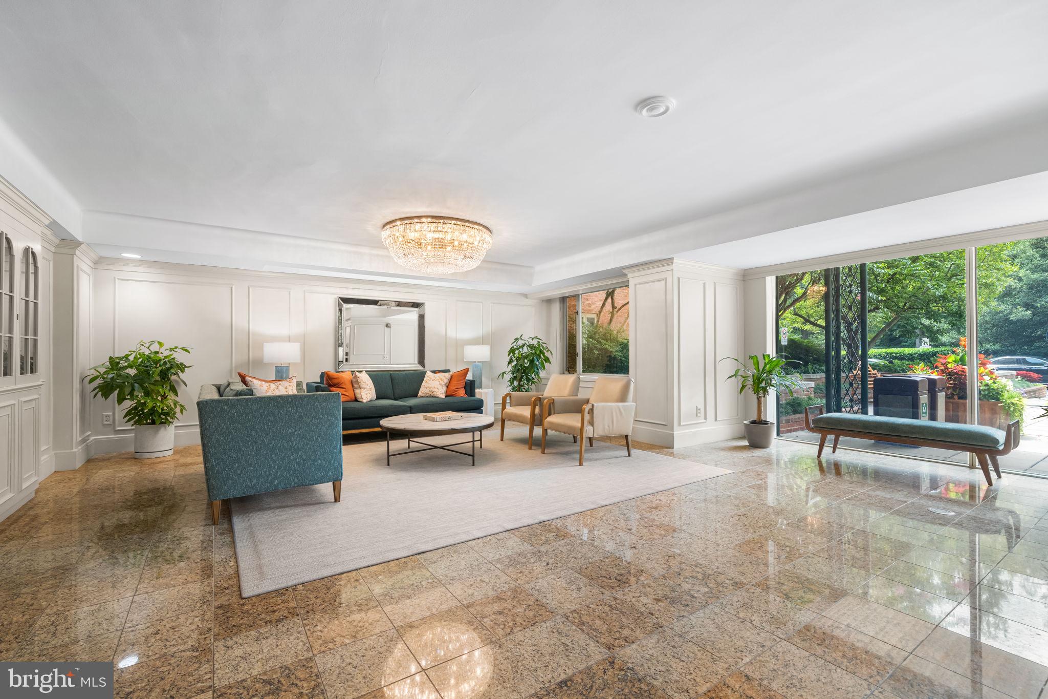 4301 Massachusetts Avenue Northwest, Unit 6006 Washington, DC 20016 - Photo 32 of 33 a living room with furniture and a large window