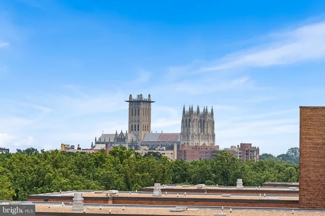 a view of a city with tall buildings in the background