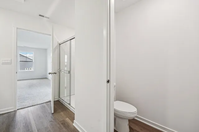 a view of a room with racks on the wall