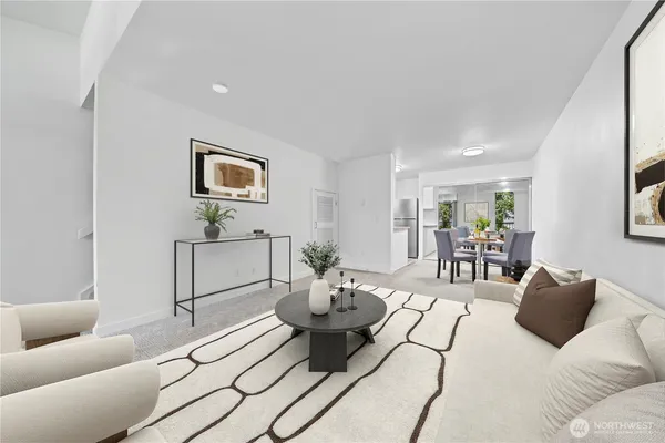 a living room with furniture and a table