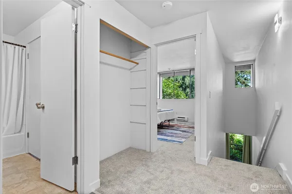 a view of room with furniture and closet