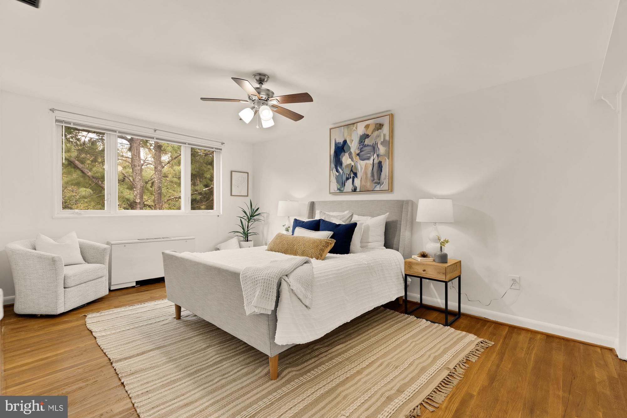 2400 41st Street Northwest, Unit 502 Washington, DC 20007 - Photo 19 of 25 a bedroom with a bed and a couch
