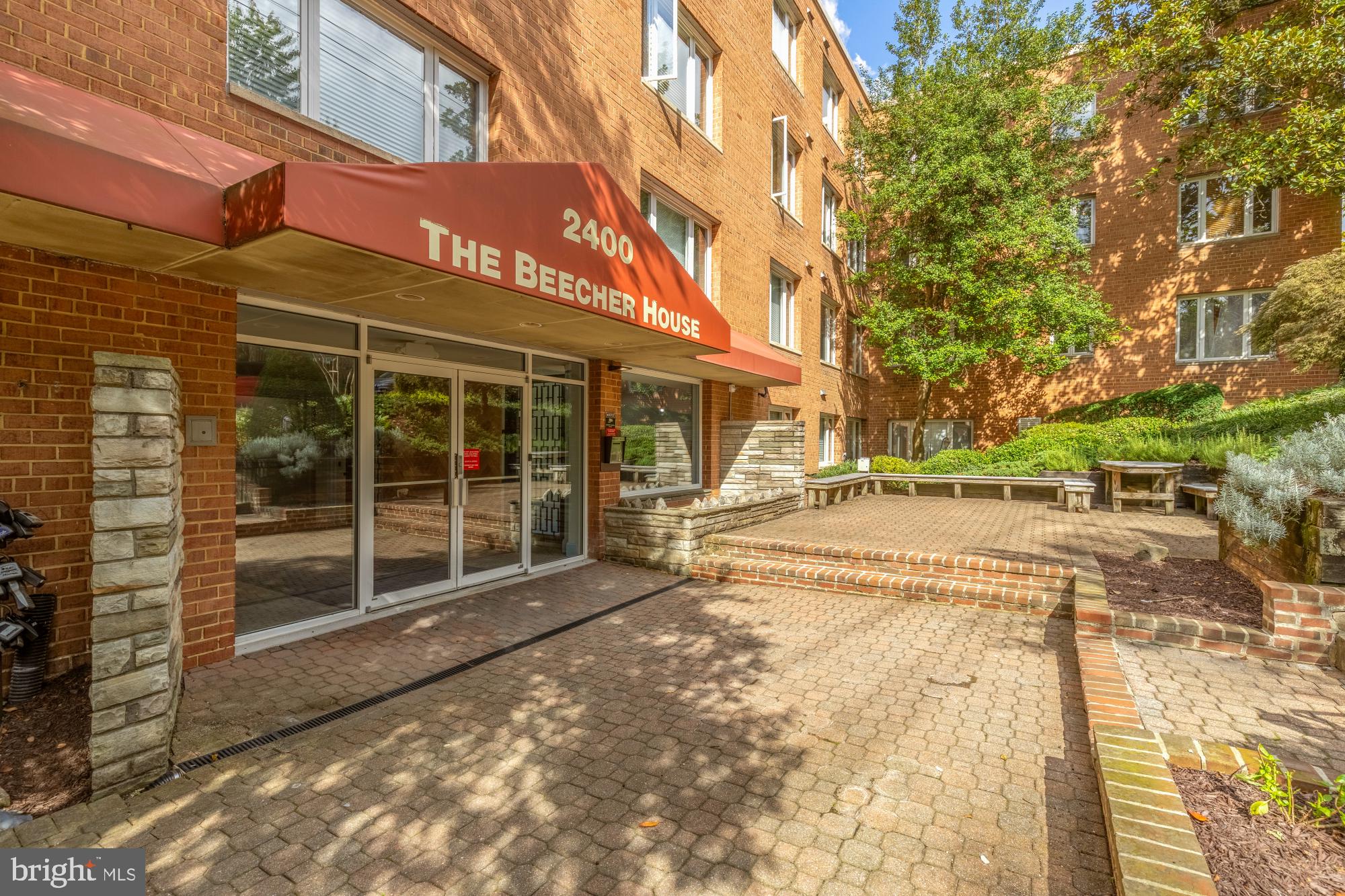 2400 41st Street Northwest, Unit 502 Washington, DC 20007 - Photo 24 of 25 a view of a building with a outdoor space