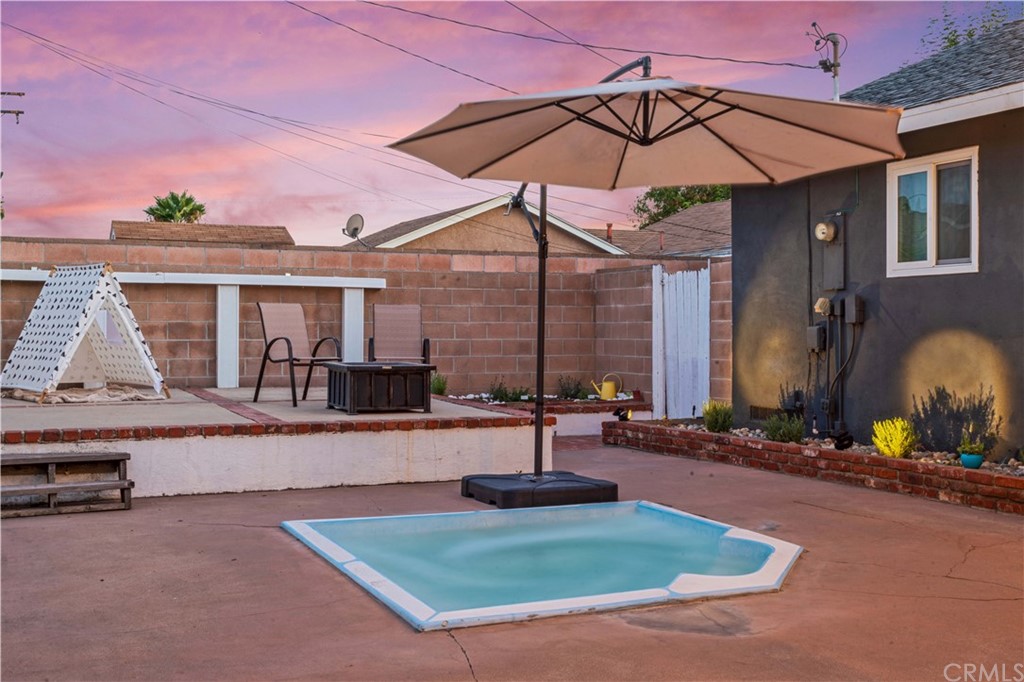 4902 McCormack Lane Placentia, CA 92870 - Photo 3 of 16 a view of a house with a swimming pool and sitting area