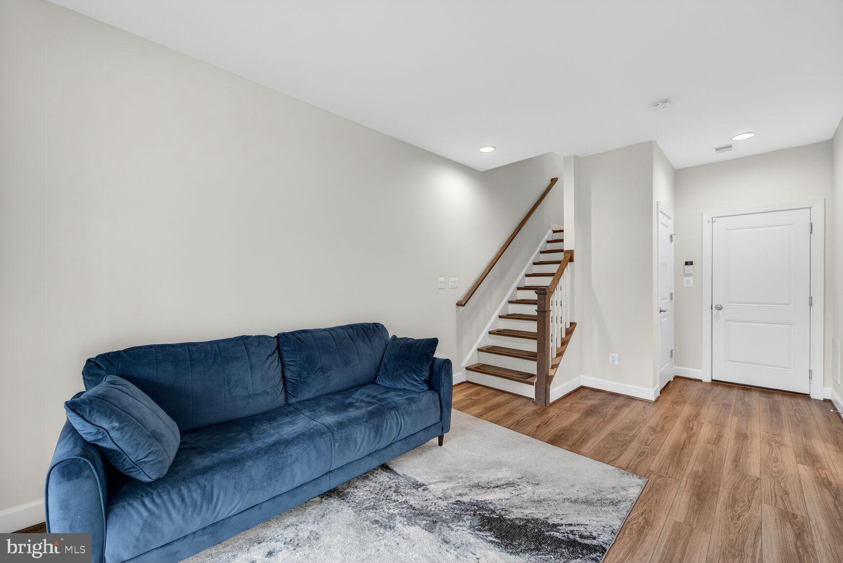 5241 Ridgeview Retreat Drive Chantilly, VA 20151 - Photo 21 of 32 a living room with furniture and wooden floor