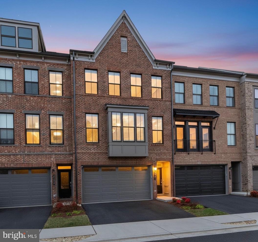 5241 Ridgeview Retreat Drive Chantilly, VA 20151 - Photo 3 of 32 a front view of a multi story residential apartment building