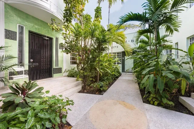 a plant is in front of a house