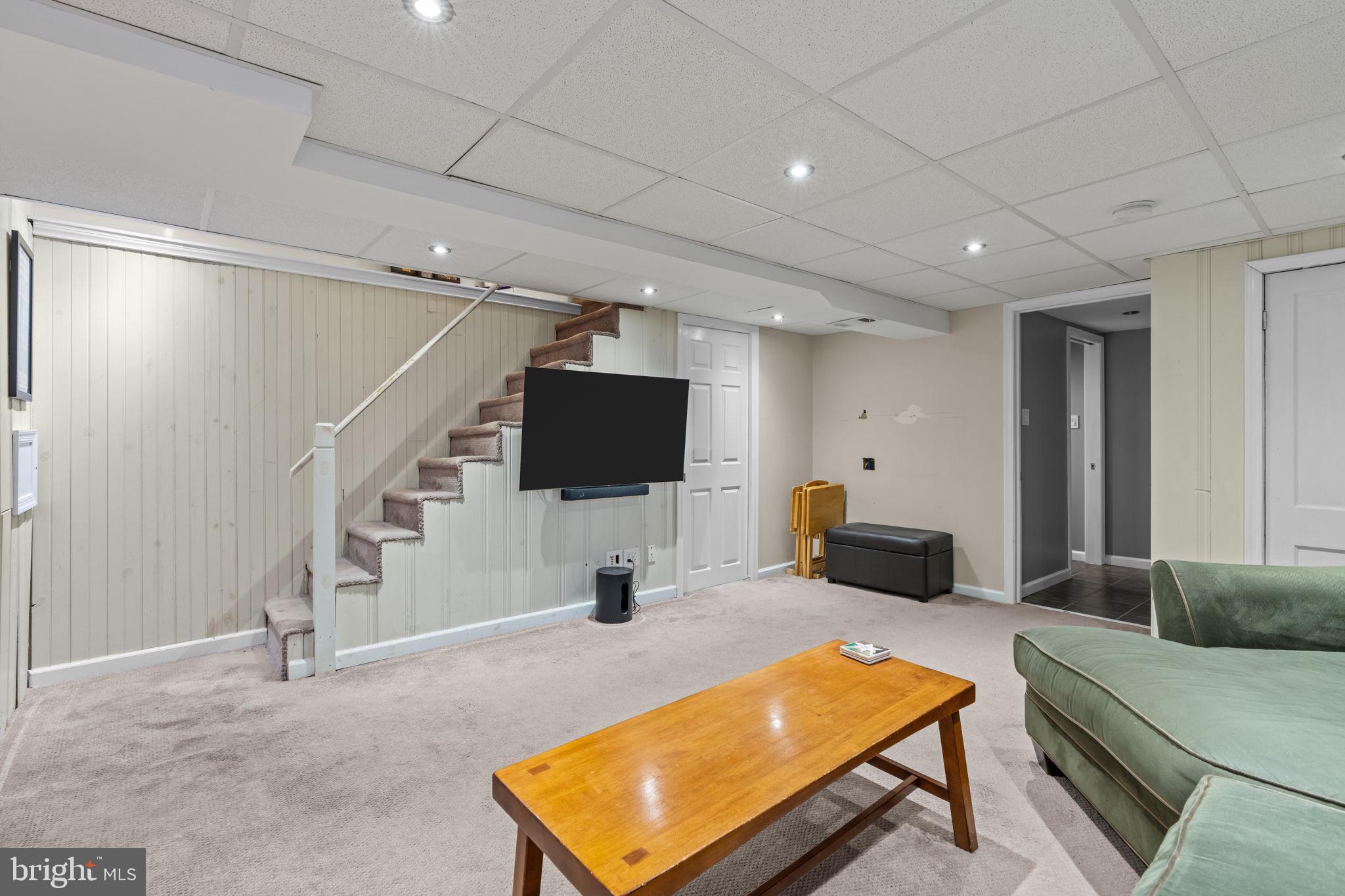 4009 Redden Road Drexel Hill, PA 19026 - Photo 15 of 21 a living room with furniture and a flat screen tv