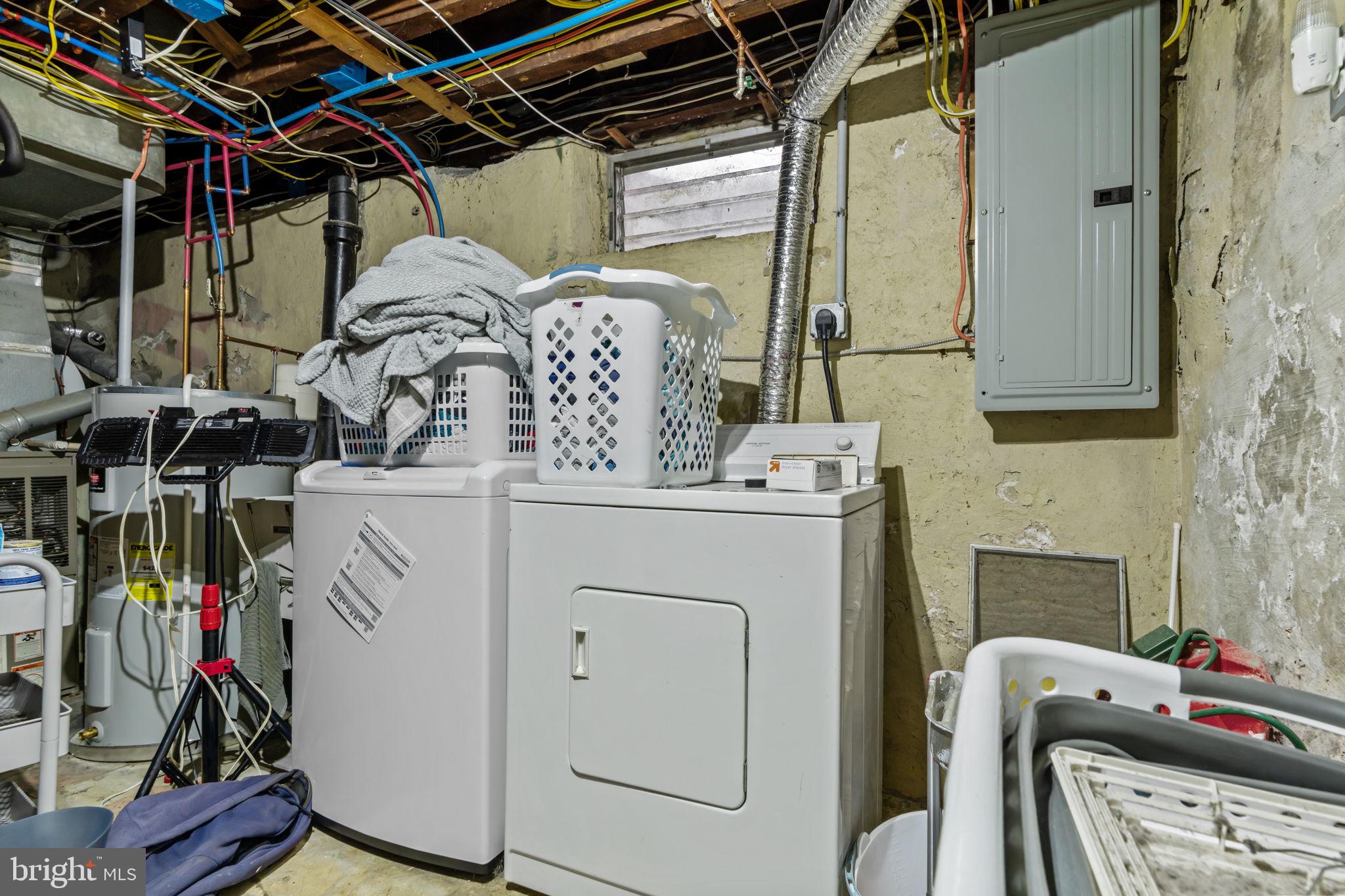 4009 Redden Road Drexel Hill, PA 19026 - Photo 17 of 21 a utility room with dryer and washer