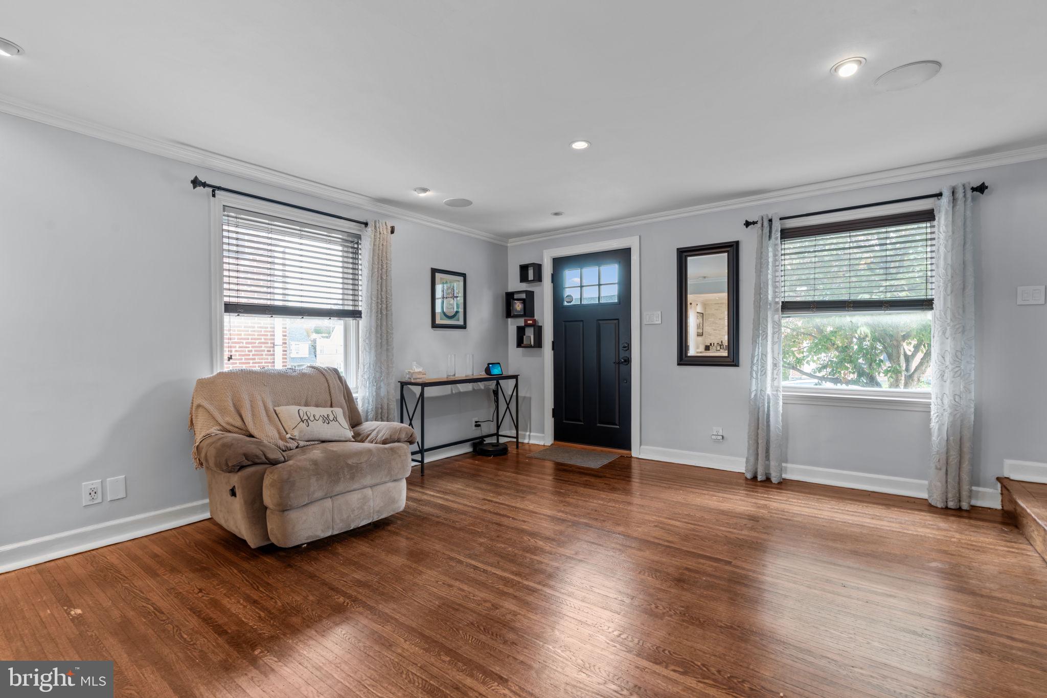 4009 Redden Road Drexel Hill, PA 19026 - Photo 4 of 21 a living room with furniture and a window