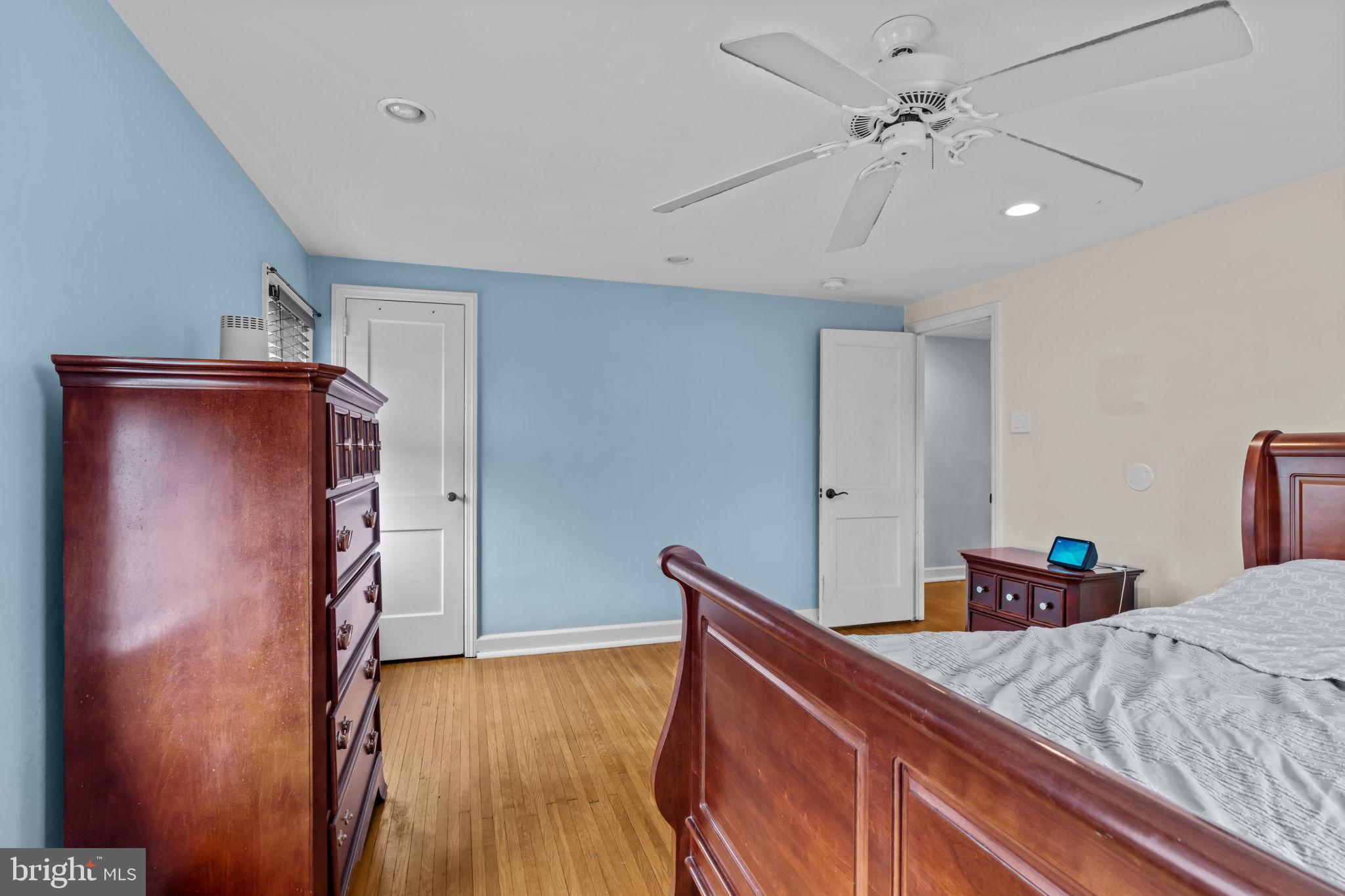 4009 Redden Road Drexel Hill, PA 19026 - Photo 10 of 21 a bed room with a bed and a ceiling fan