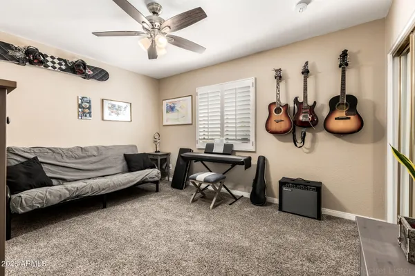 a living room with furniture and a window