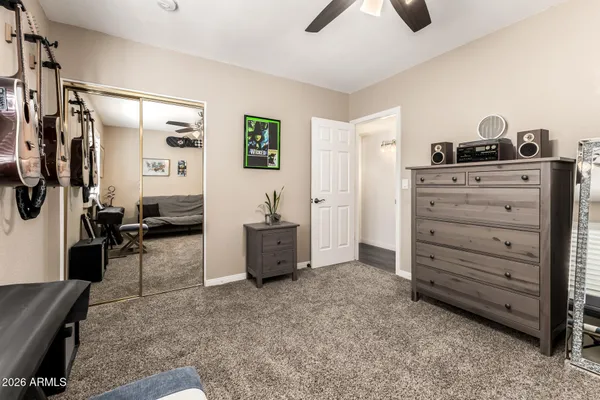 a view of room with furniture and closet