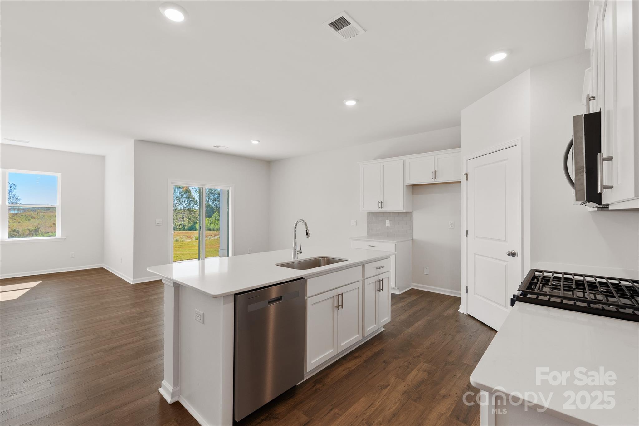 181 Salers Road Fletcher, NC 28732 - Photo 6 of 24 a kitchen with a sink appliances and cabinets
