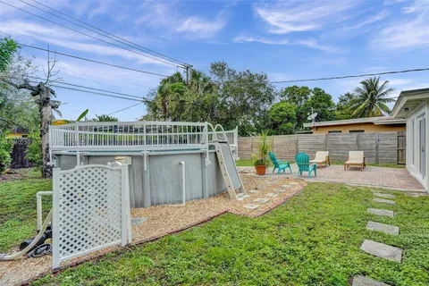 a view of a deck with a yard
