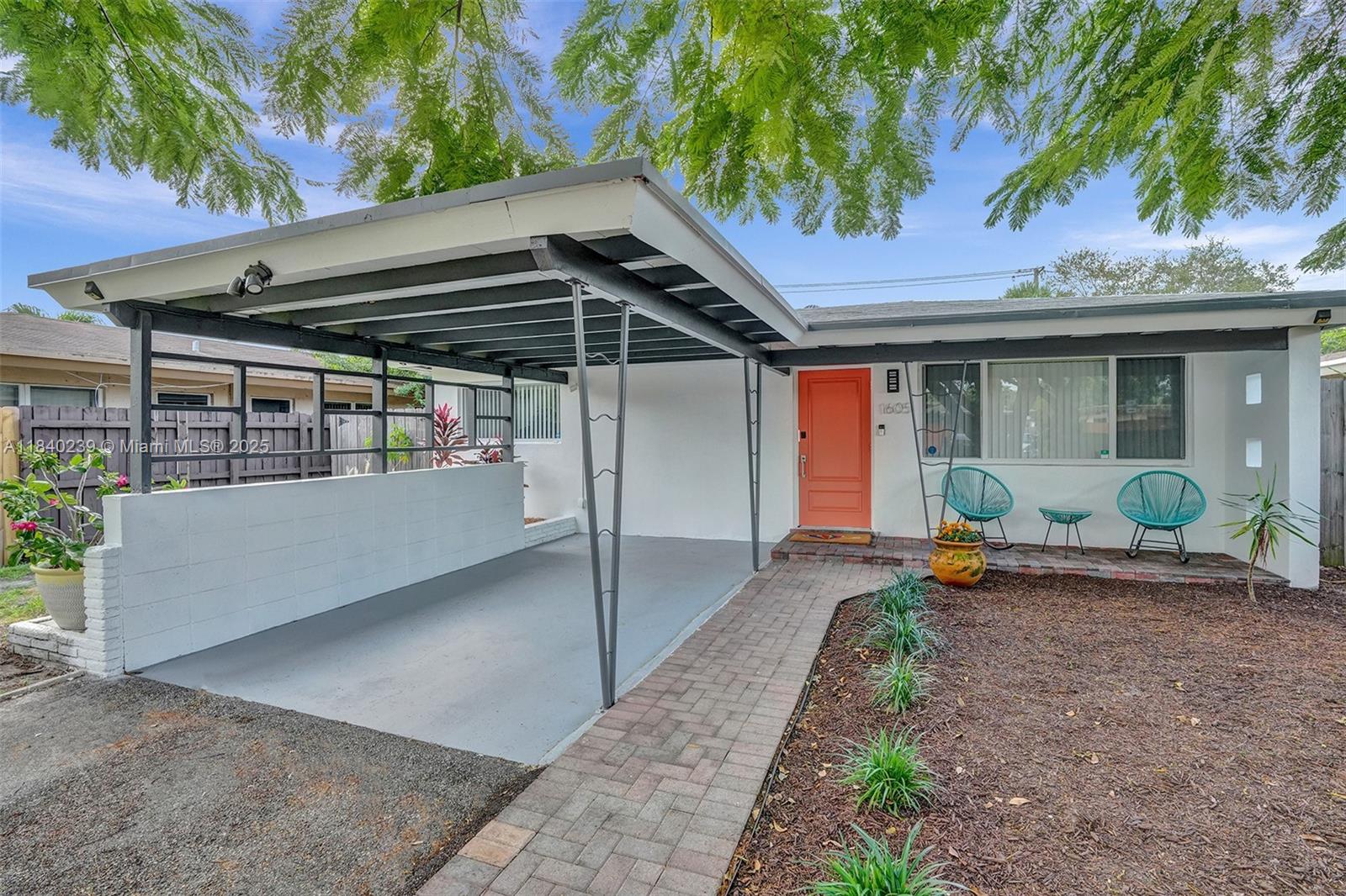 1605 Northwest 7th Terrace Fort Lauderdale, FL 33311 - Photo 3 of 33 a view of a chair and table in the patio