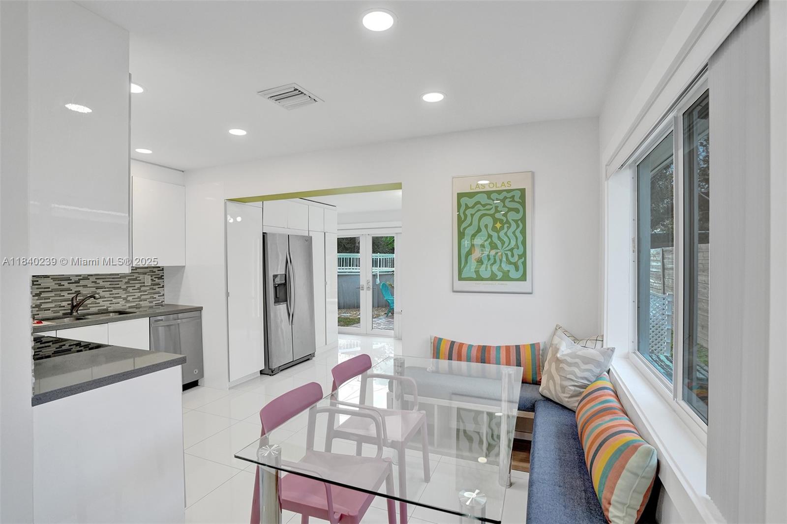 1605 Northwest 7th Terrace Fort Lauderdale, FL 33311 - Photo 8 of 33 a living room with furniture and a stove