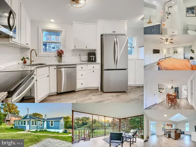 a kitchen with stainless steel appliances granite countertop a sink and a refrigerator