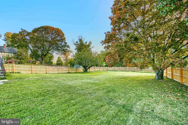a view of a house with a big yard