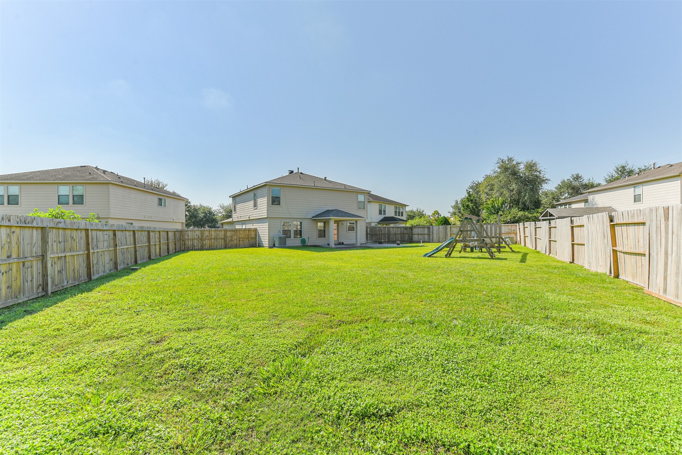 9207 Cribbage Court Houston, TX 77083 - Photo 20 of 47 a front view of a house with garden