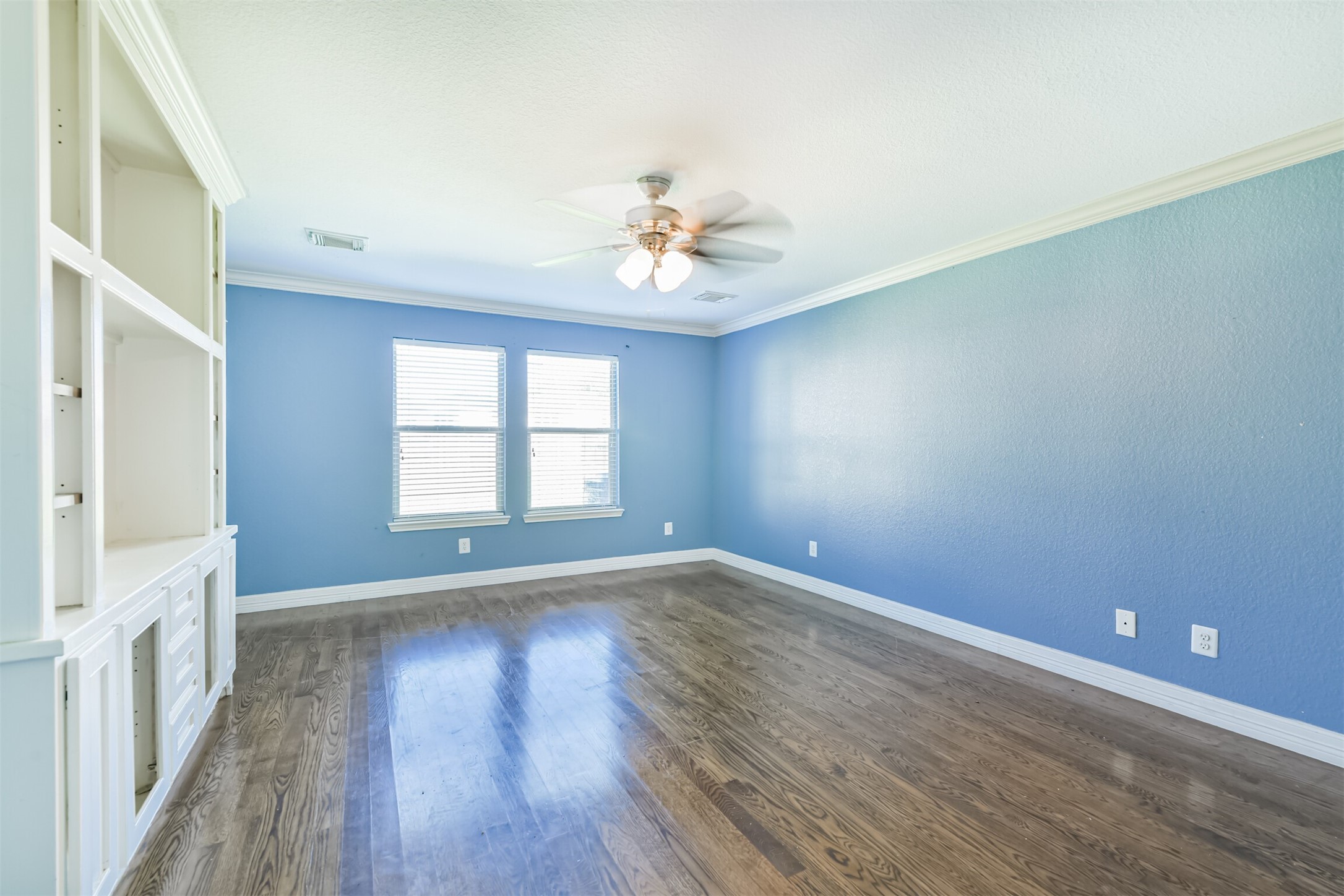 9207 Cribbage Court Houston, TX 77083 - Photo 30 of 47 wooden floor in an empty room with a window
