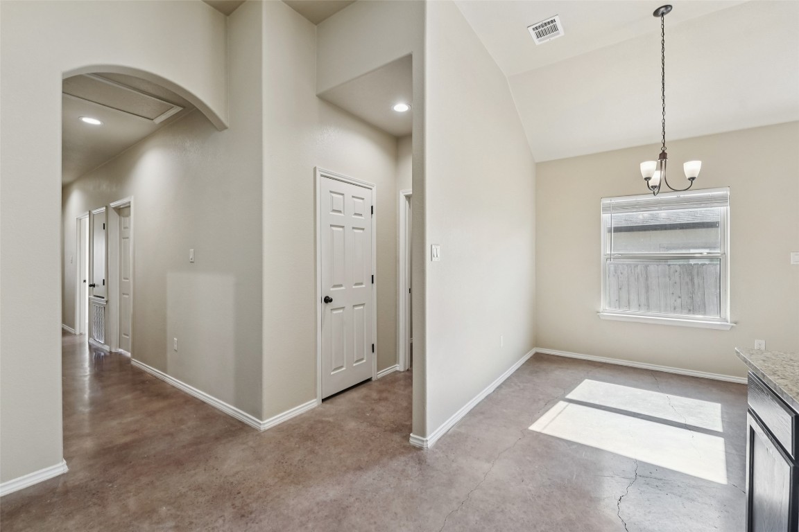 402 Jack Rabbit Lane, Unit B Buda, TX 78610 - Photo 15 of 30 a view of an empty room with a window