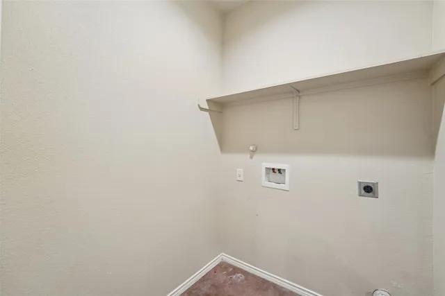 a bathroom with a toilet sink and shower