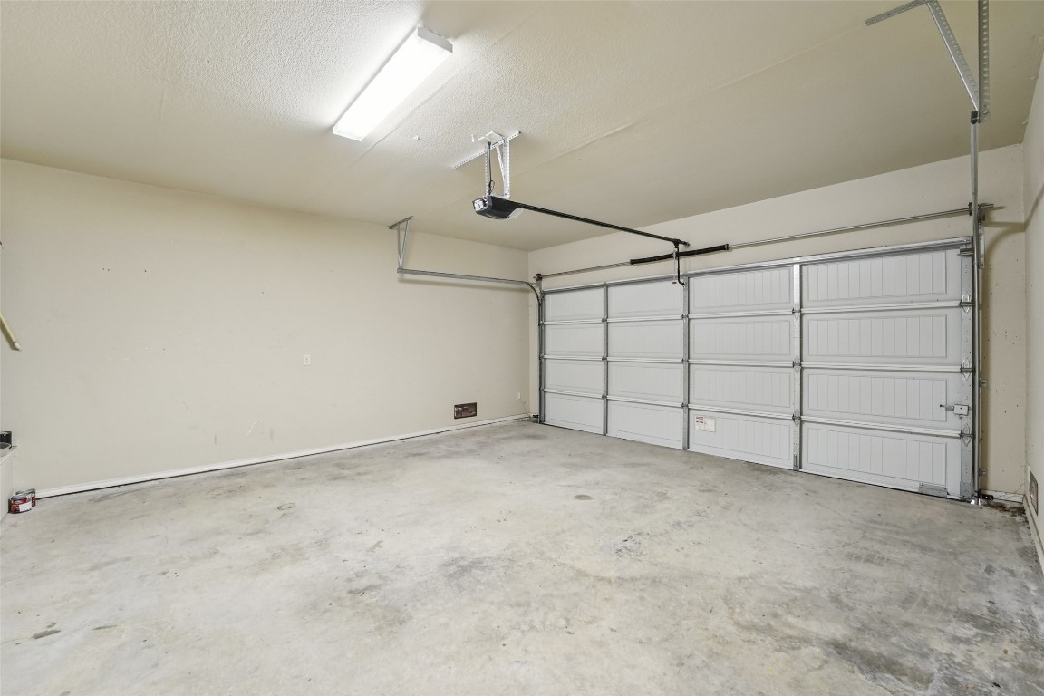 402 Jack Rabbit Lane, Unit B Buda, TX 78610 - Photo 26 of 30 a view of a garage