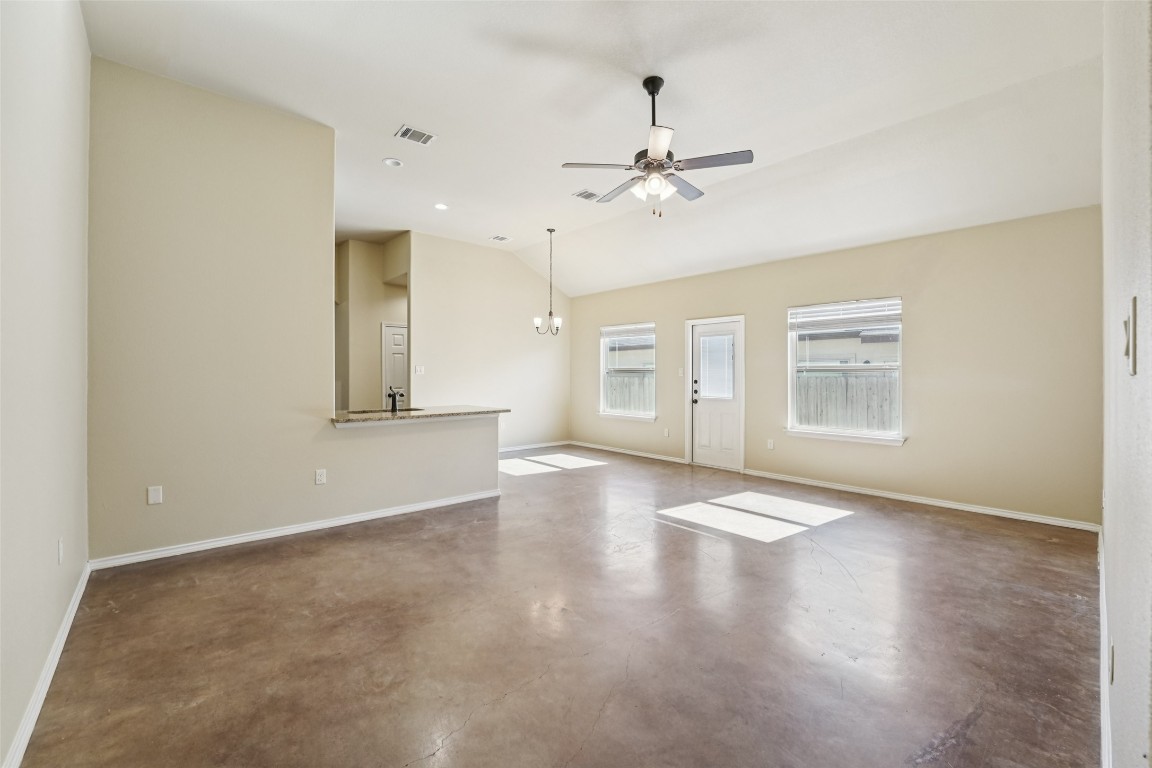 402 Jack Rabbit Lane, Unit B Buda, TX 78610 - Photo 5 of 30 a view of an empty room with a window