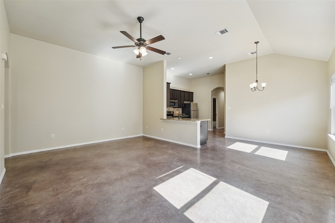 402 Jack Rabbit Lane, Unit B Buda, TX 78610 - Photo 8 of 30 a view of a kitchen with a sink and cabinet area