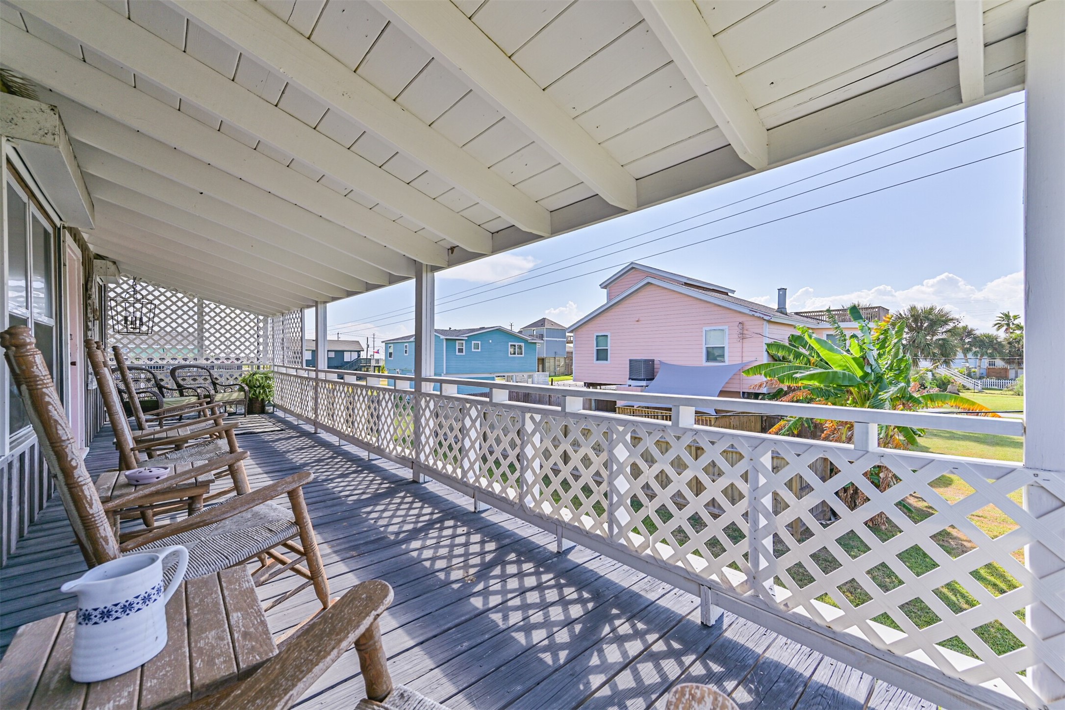 16519 Captain Kidd Road Jamaica Beach, TX 77554 - Photo 20 of 32 a view of balcony with wooden floor