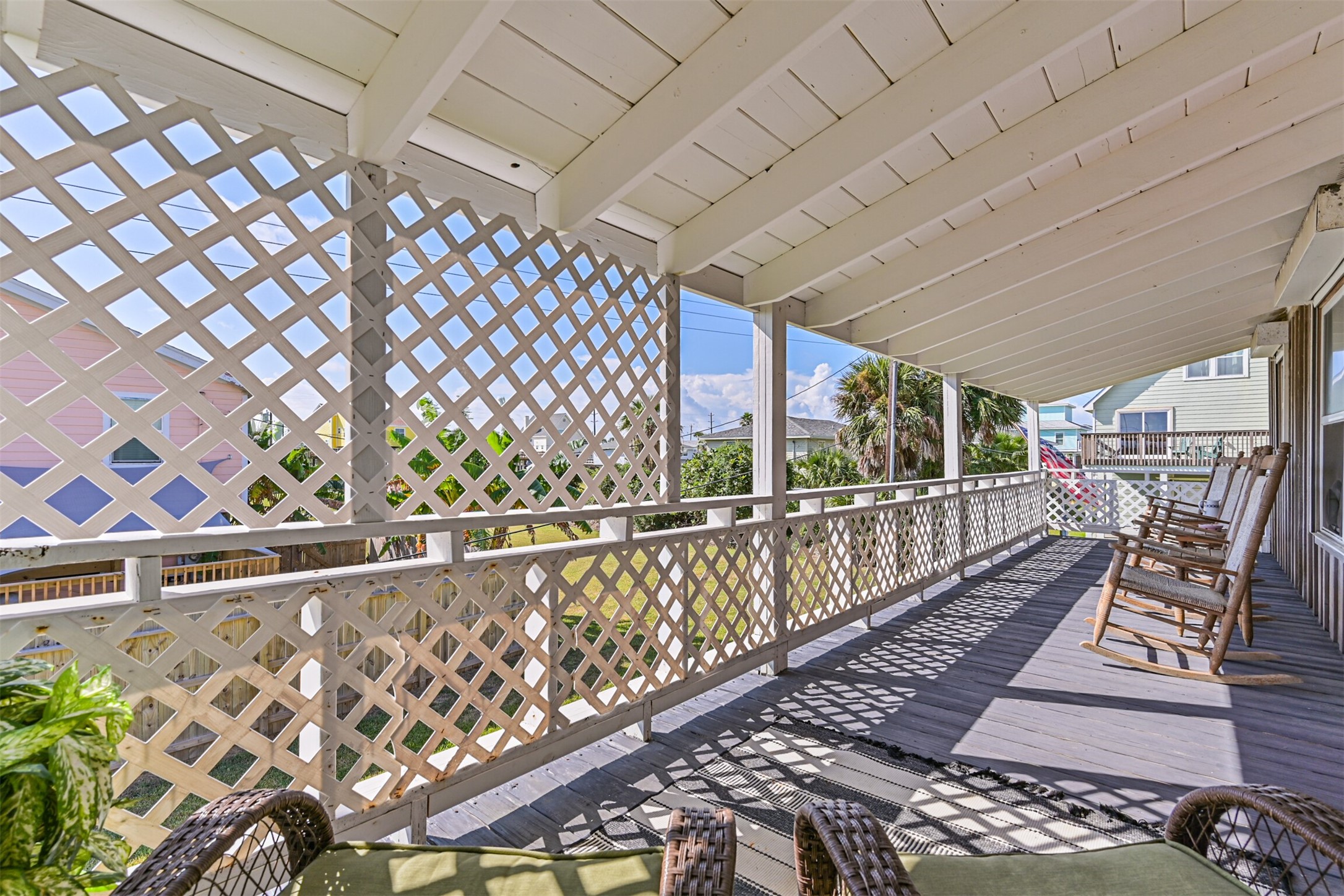 16519 Captain Kidd Road Jamaica Beach, TX 77554 - Photo 22 of 32 a view of balcony with wooden floor