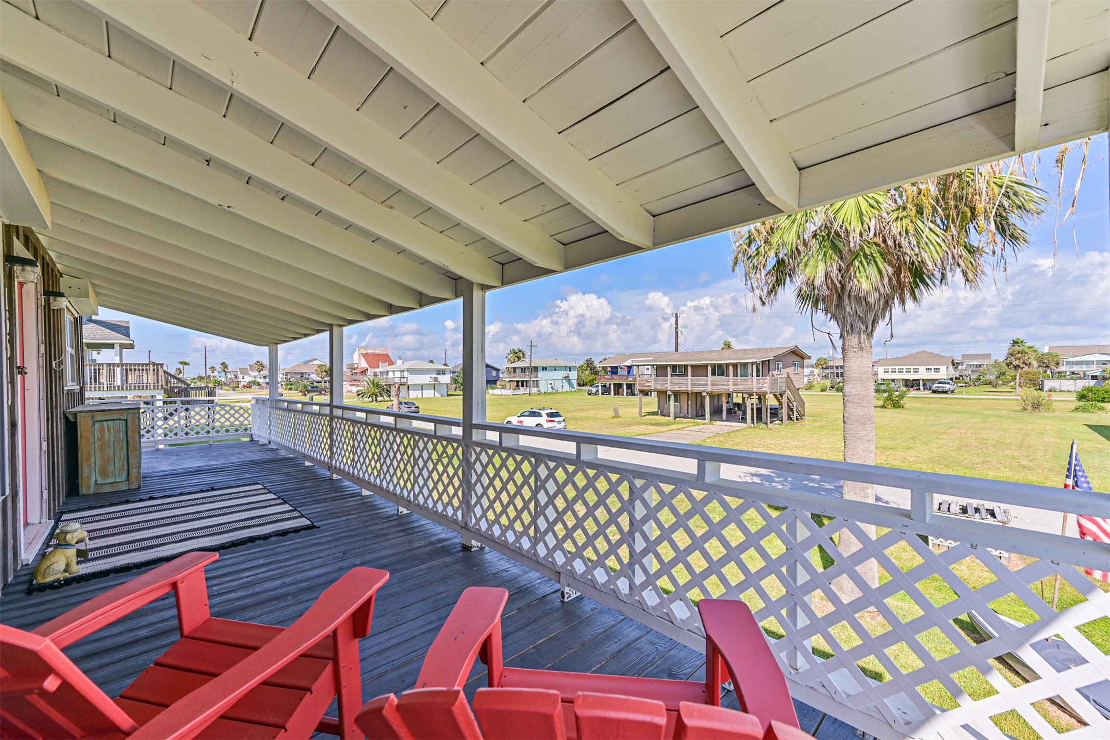 16519 Captain Kidd Road Jamaica Beach, TX 77554 - Photo 23 of 32 a view of a patio with wooden floor